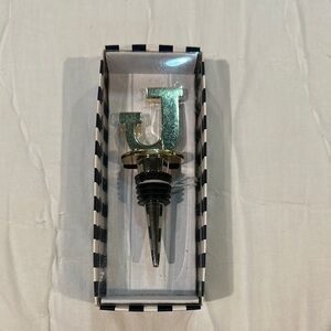 C. Wonder Monogram Wine Stopper